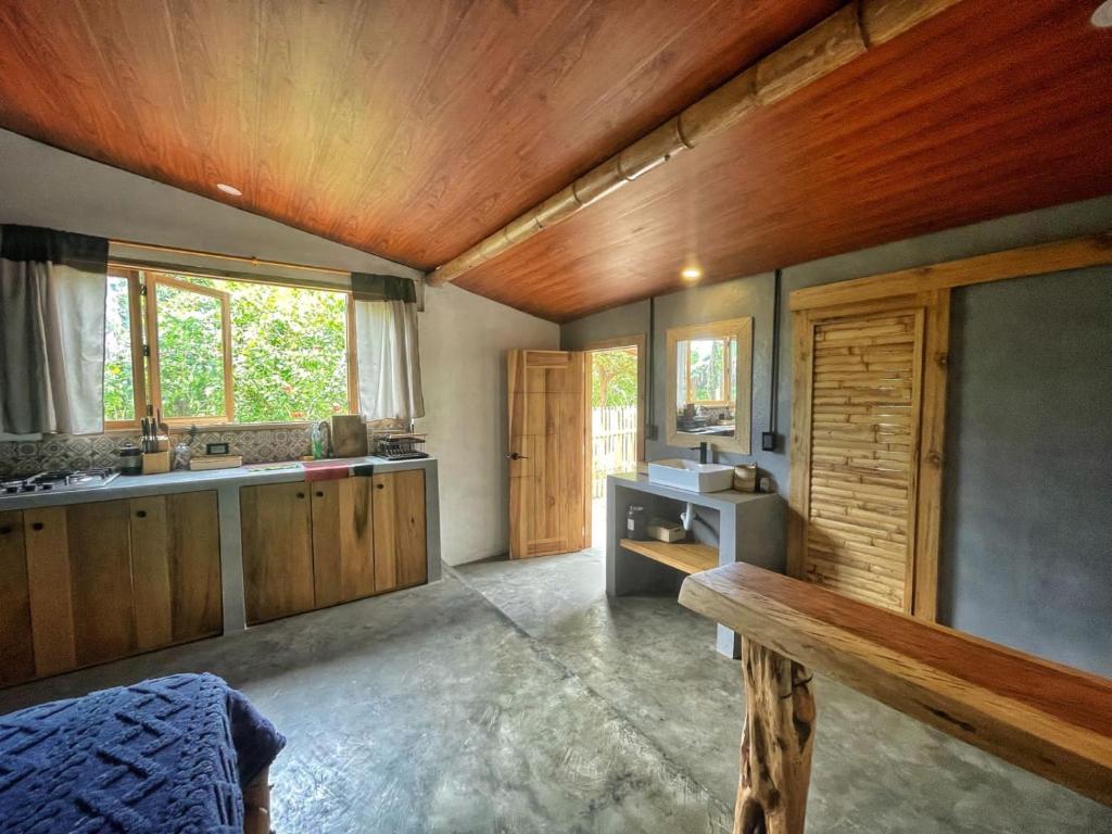 Kuchyň nebo kuchyňský kout v ubytování Hotel Palma Coco