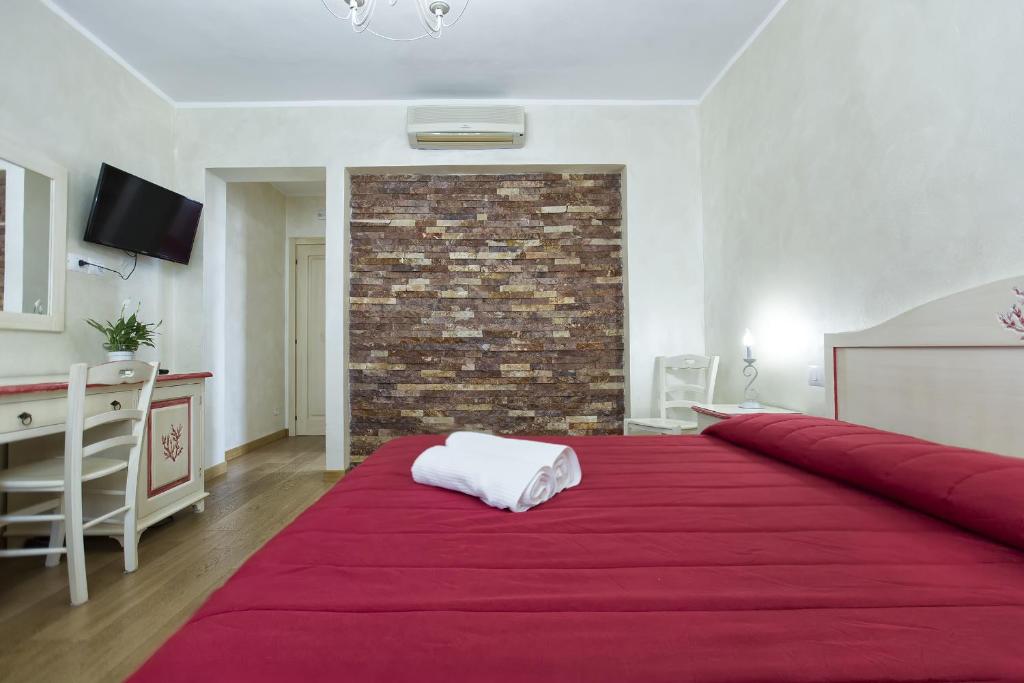 Postel nebo postele na pokoji v ubytování Morpheo Rooms