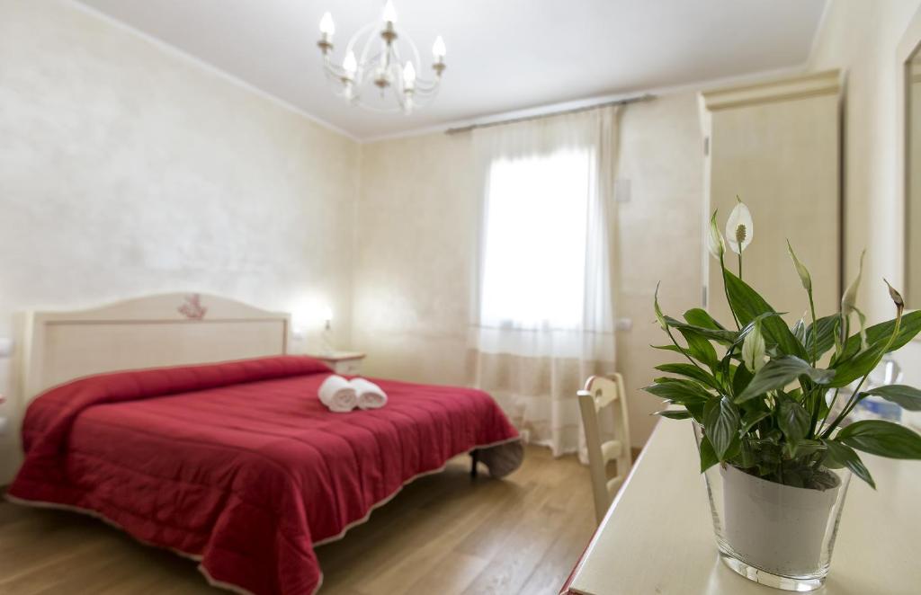 Postel nebo postele na pokoji v ubytování Morpheo Rooms