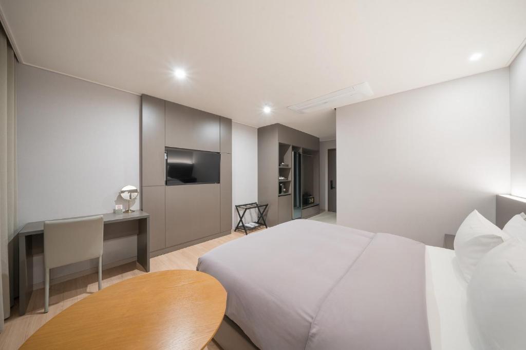 Postel nebo postele na pokoji v ubytování Act Hotel
