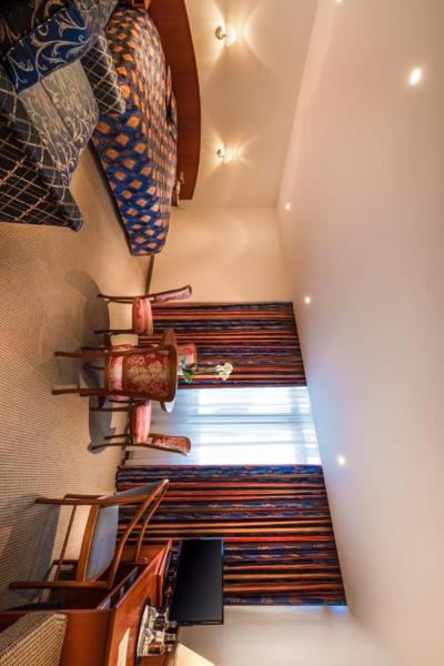 Postel nebo postele na pokoji v ubytování Hotel Alte Wache