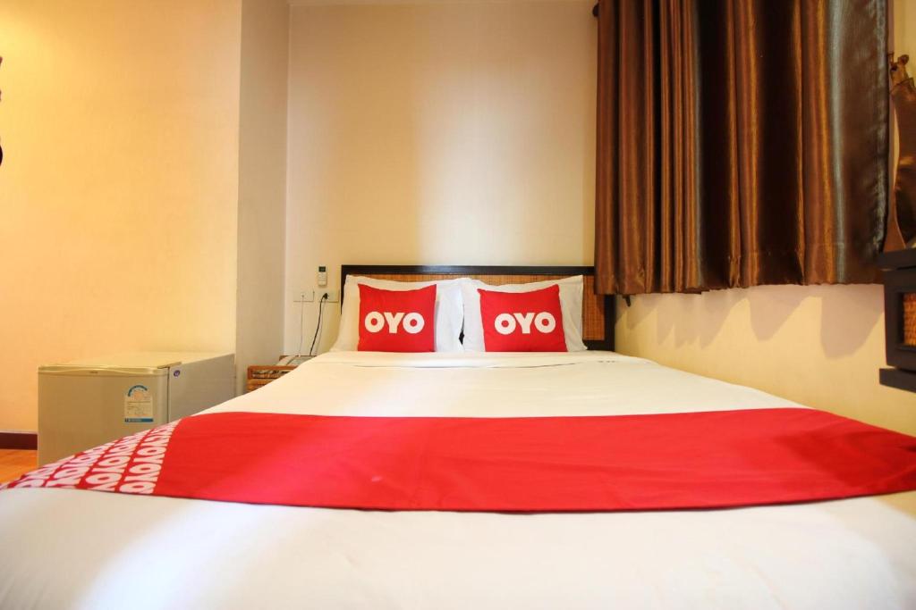 Postel nebo postele na pokoji v ubytování Pannee Lodge Khaosan - SHA Plus