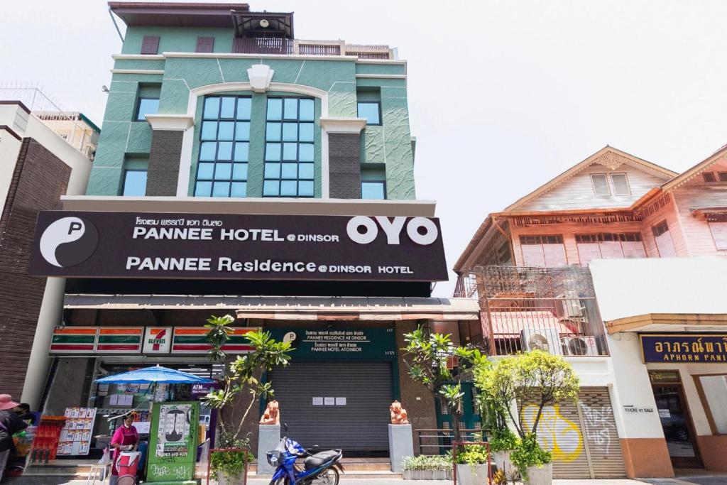 a building with an ovo sign in front of it at Super OYO 483 Pannee Hotel Khaosan in Bangkok