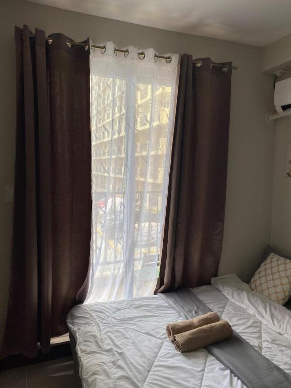 Postel nebo postele na pokoji v ubytování E&S Nest