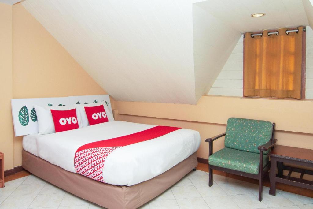 Postel nebo postele na pokoji v ubytování OYO 534 Phasuk Hotel