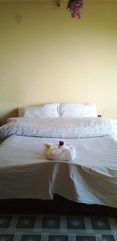Postel nebo postele na pokoji v ubytování Gaurav Homestay