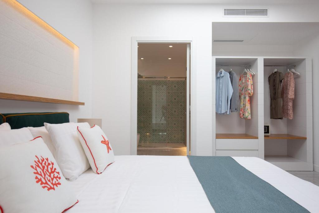 Postel nebo postele na pokoji v ubytování Gioì Hotel Sorrento