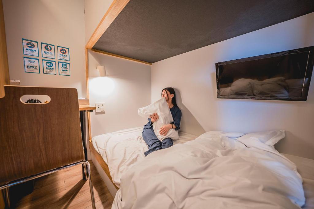 Postel nebo postele na pokoji v ubytování hotel atarayo osaka