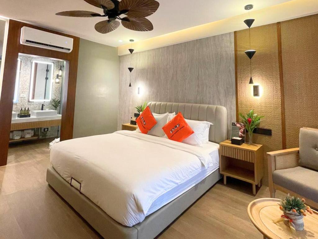Postel nebo postele na pokoji v ubytování El Nido Garden Resort