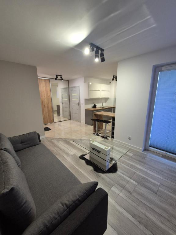 Posezení v ubytování Megga Apartament z Garażem, FV