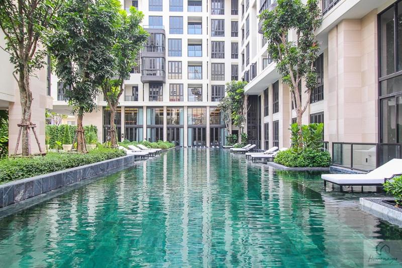 a pool of water in the middle of a building at Luxury Japanese Onsen Reserve - Bangkok in Bangkok