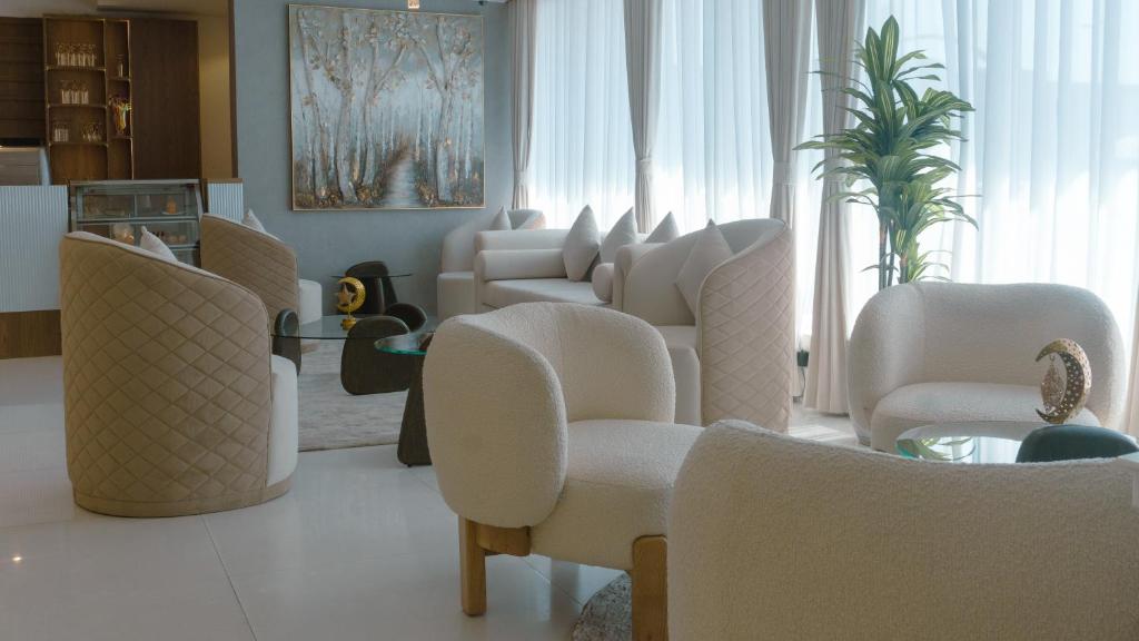 Posezení v ubytování Royal Grand Suite Hotel