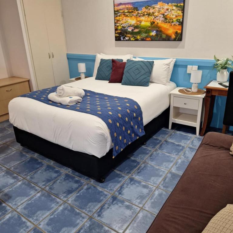 Postel nebo postele na pokoji v ubytování Central Studio Accommodation