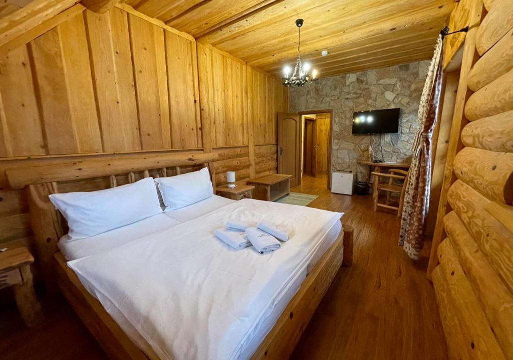 Postel nebo postele na pokoji v ubytování Srub u Medvěda