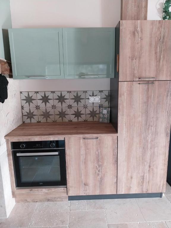Eldhús eða eldhúskrókur á Gîte Au point de Vue