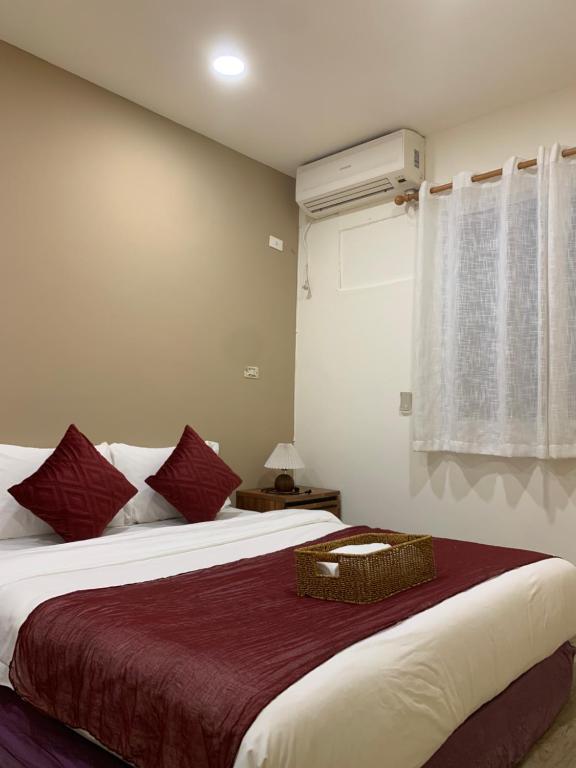 Una cama o camas en una habitación de Ola 蕊夏南灣包棟民宿