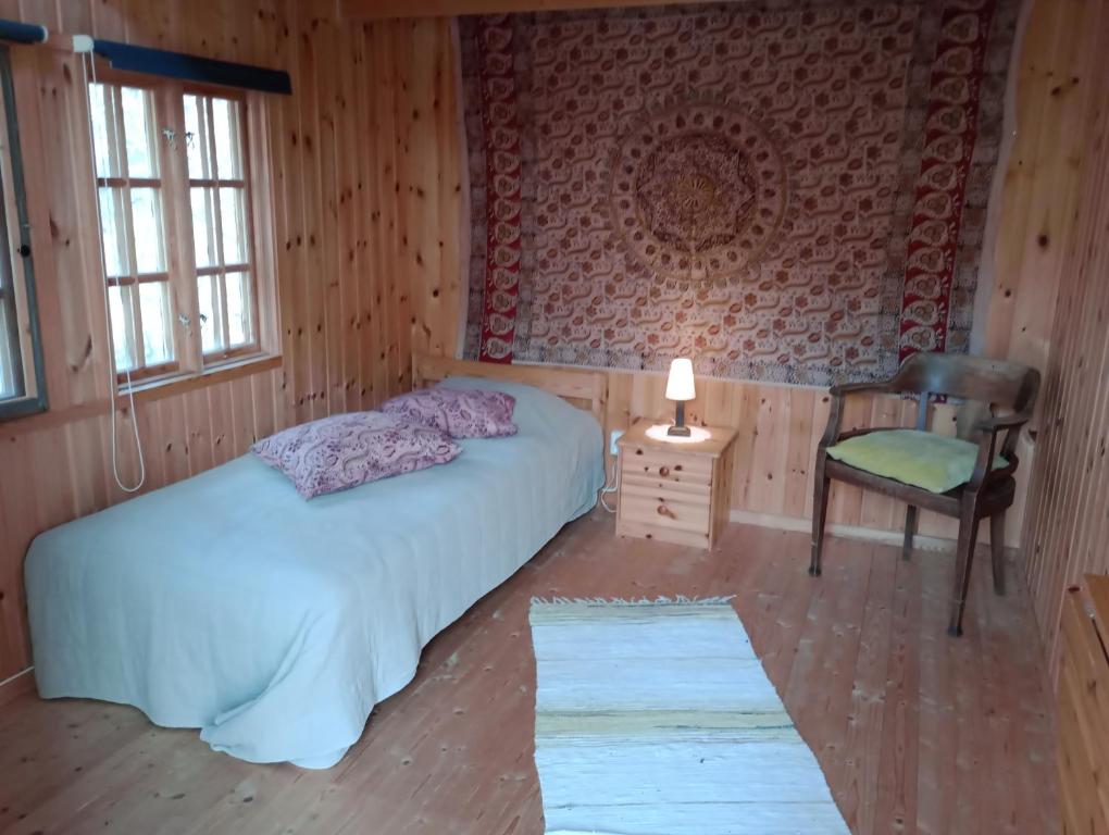 Postel nebo postele na pokoji v ubytování Alva Stugby Gotland