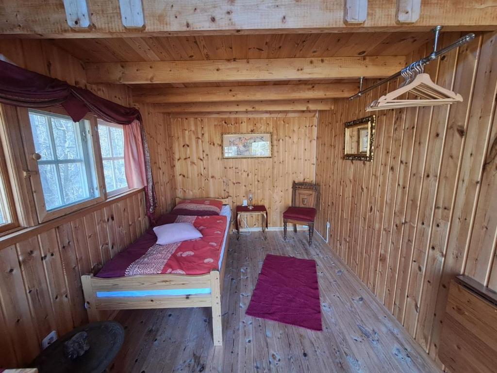 Postel nebo postele na pokoji v ubytování Alva Stugby Gotland