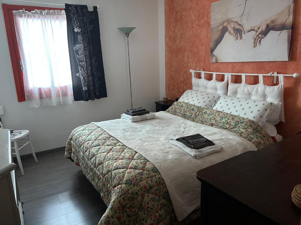 A bed or beds in a room at Ca del nono