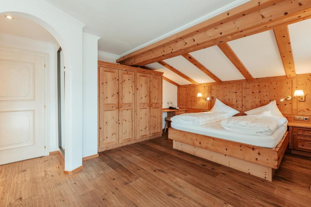 Postel nebo postele na pokoji v ubytování Biohotel Schweitzer
