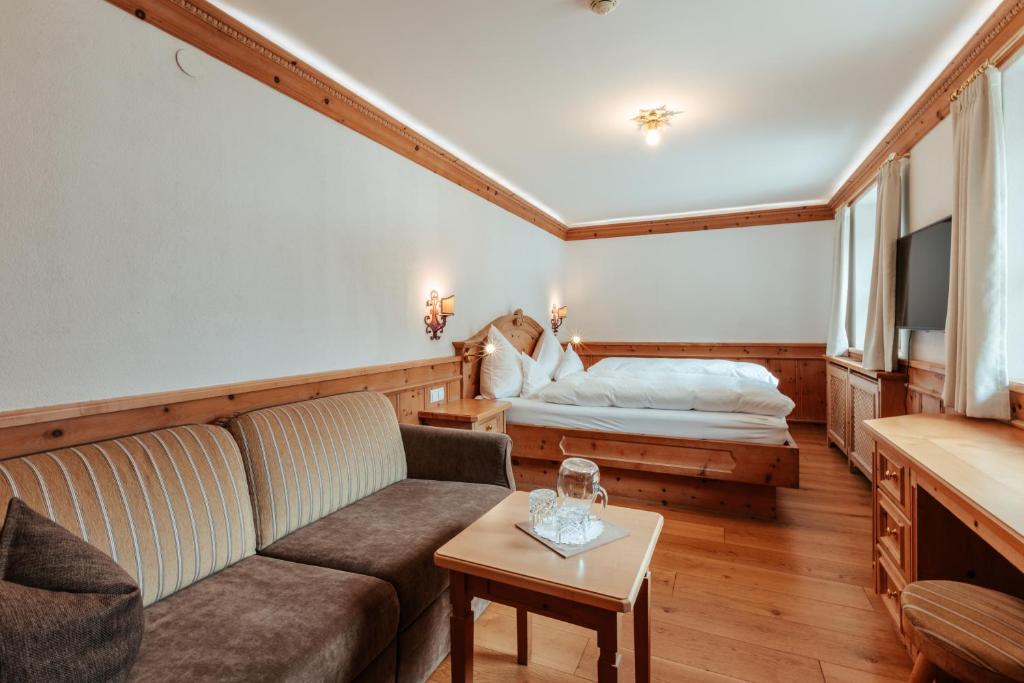 Postel nebo postele na pokoji v ubytování Biohotel Schweitzer