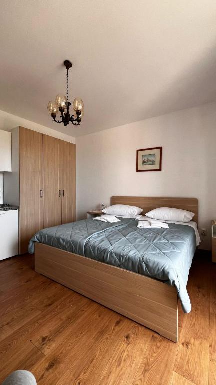Posteľ alebo postele v izbe v ubytovaní Apartment Zana