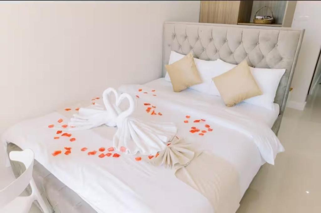 Postel nebo postele na pokoji v ubytování Palms La Union Beachfront Suites