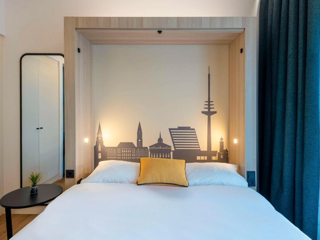 Postel nebo postele na pokoji v ubytování Aparthotel Adagio Access Kiel