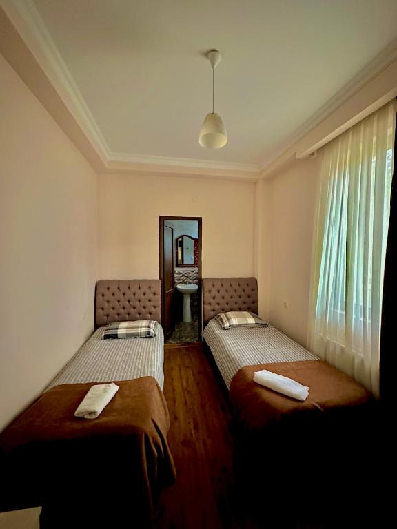 Postel nebo postele na pokoji v ubytování Hotel balcony