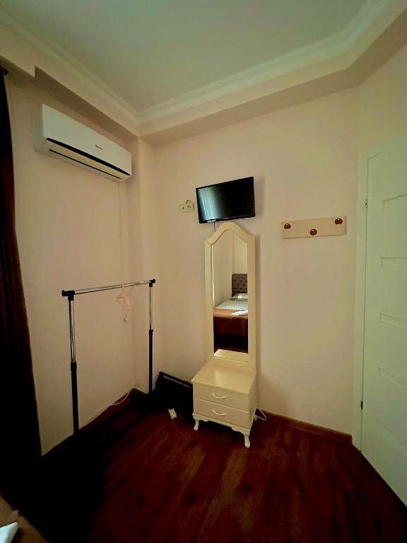 TV a/nebo společenská místnost v ubytování Hotel balcony