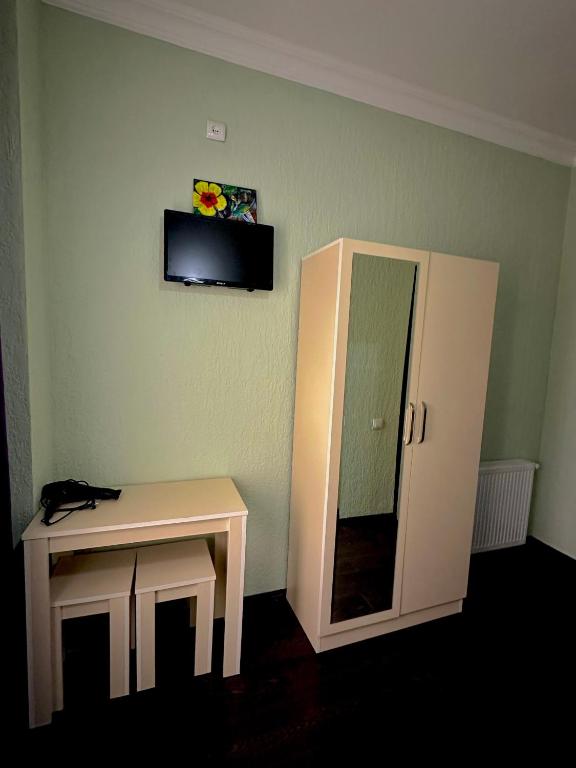 TV a/nebo společenská místnost v ubytování Hotel balcony