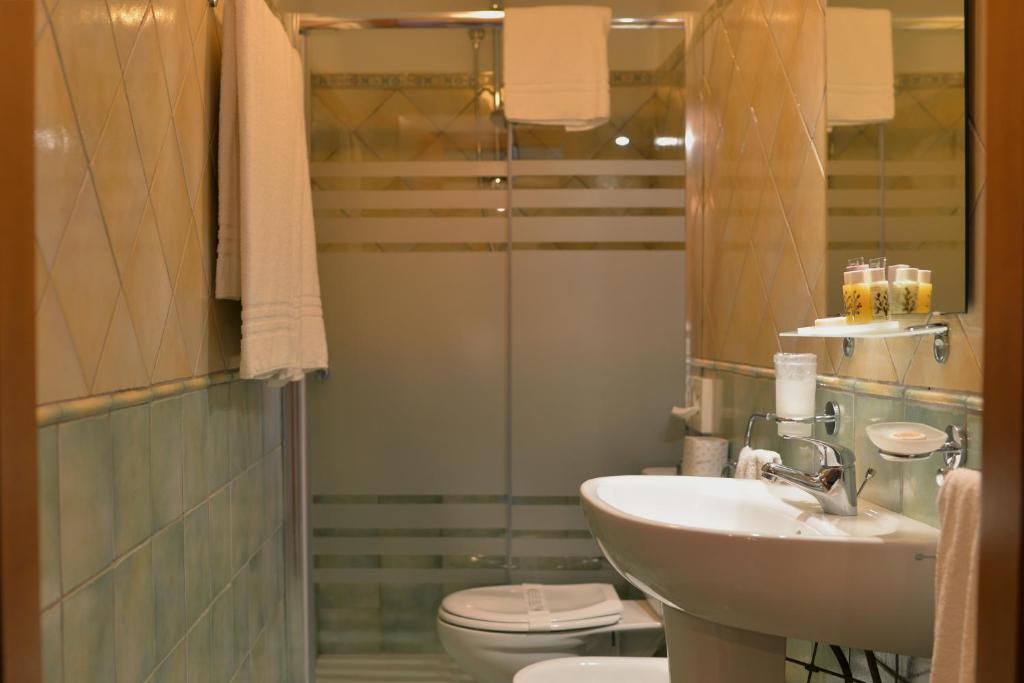 Koupelna v ubytování Hotel Donna Rosa