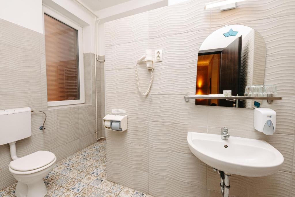 Koupelna v ubytování Hotel Metro