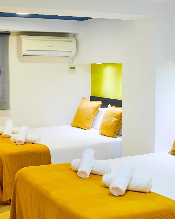 Postel nebo postele na pokoji v ubytování Sun & Moon Hostel