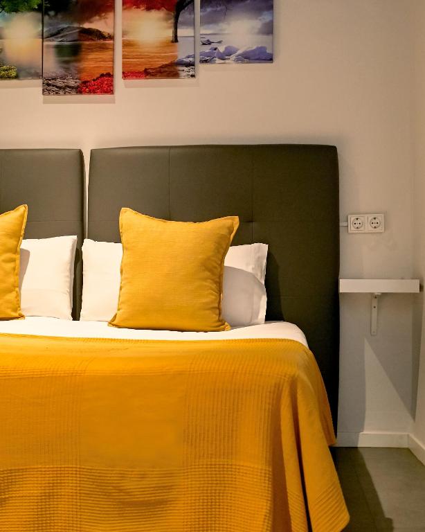 Postel nebo postele na pokoji v ubytování Sun & Moon Hostel