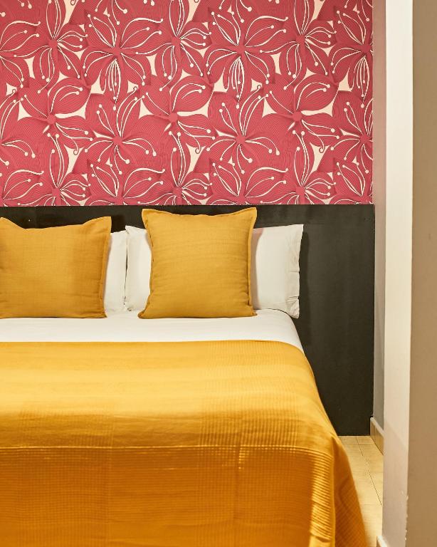 Postel nebo postele na pokoji v ubytování Sun & Moon Hostel