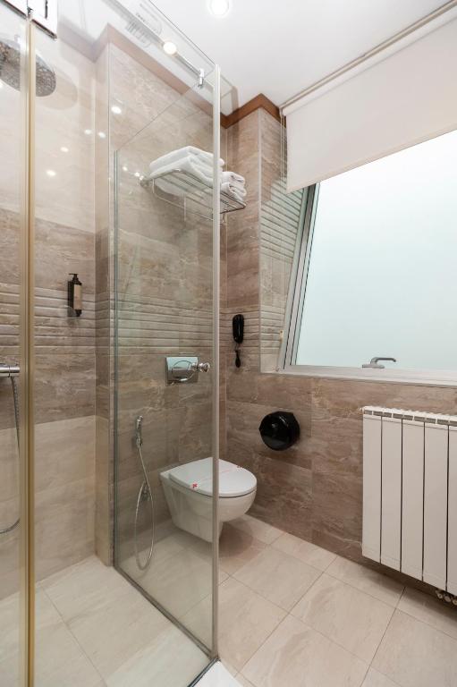 Baðherbergi á Hotel Bistrik City Center