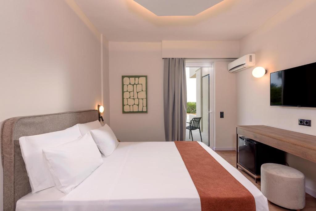 Postel nebo postele na pokoji v ubytování Zeus Hotels Ydoria Resort