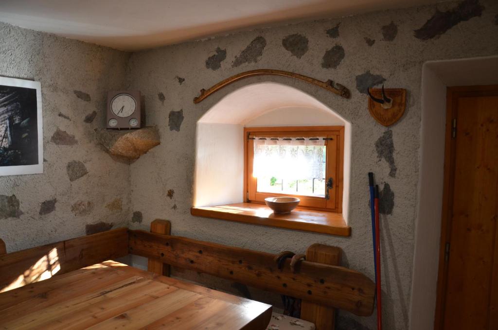 Postel nebo postele na pokoji v ubytování Chalet Maso Salam