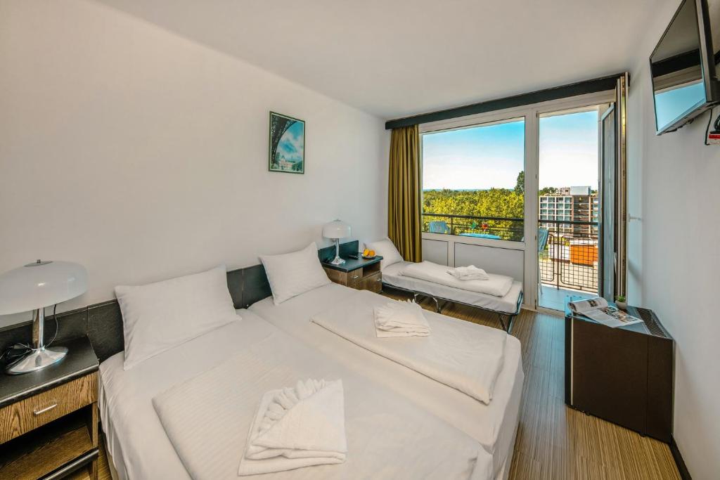 Postel nebo postele na pokoji v ubytování Hotel Európa