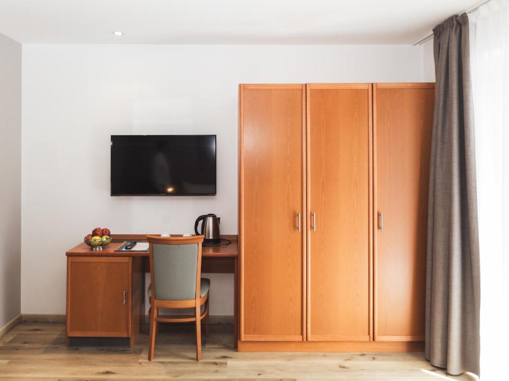 TV a/nebo společenská místnost v ubytování Hotel Panorama