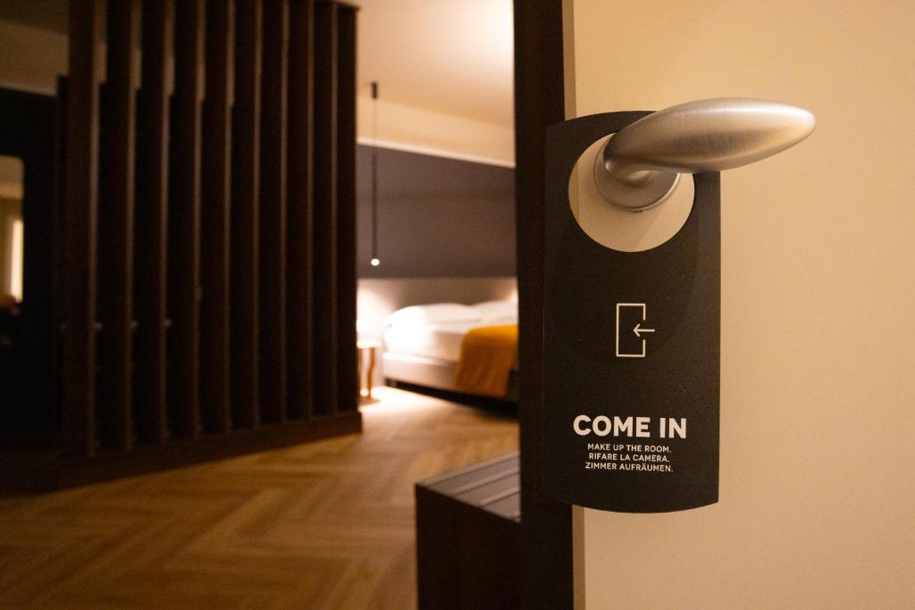 Postel nebo postele na pokoji v ubytování Arianna Suites Longevity