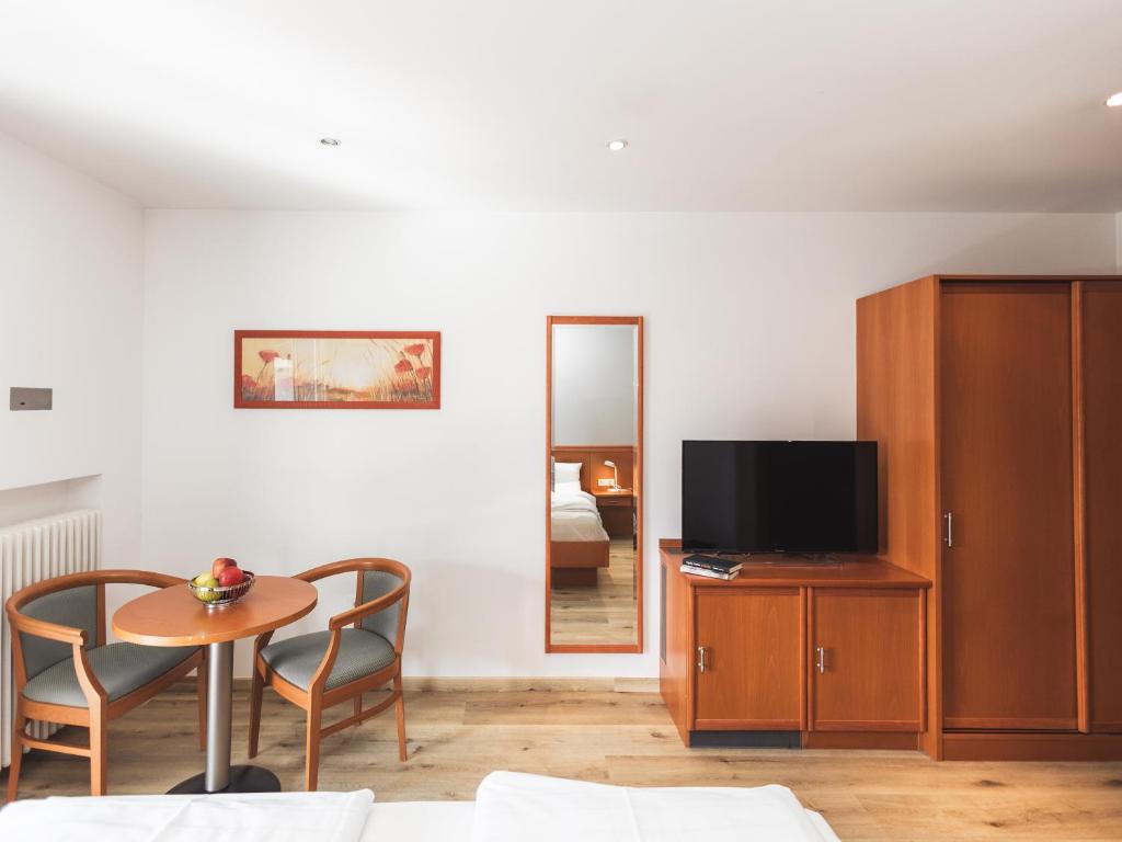 TV a/nebo společenská místnost v ubytování Hotel Panorama