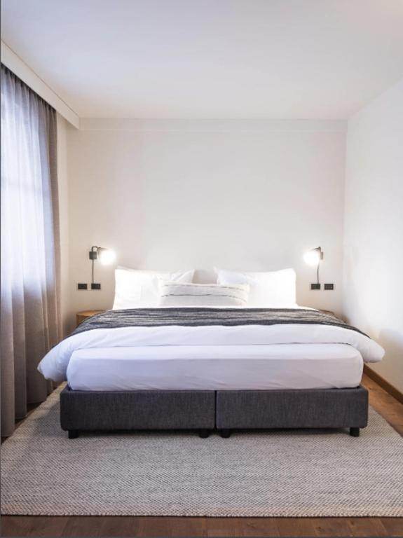 Postel nebo postele na pokoji v ubytování Hotel Bad Waldbrunn