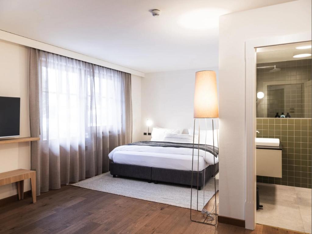 Postel nebo postele na pokoji v ubytování Hotel Bad Waldbrunn