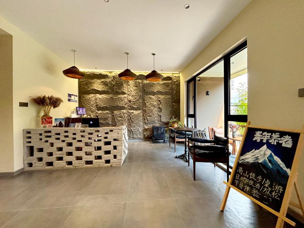 Zona de estar de Luyu Shijian B&B