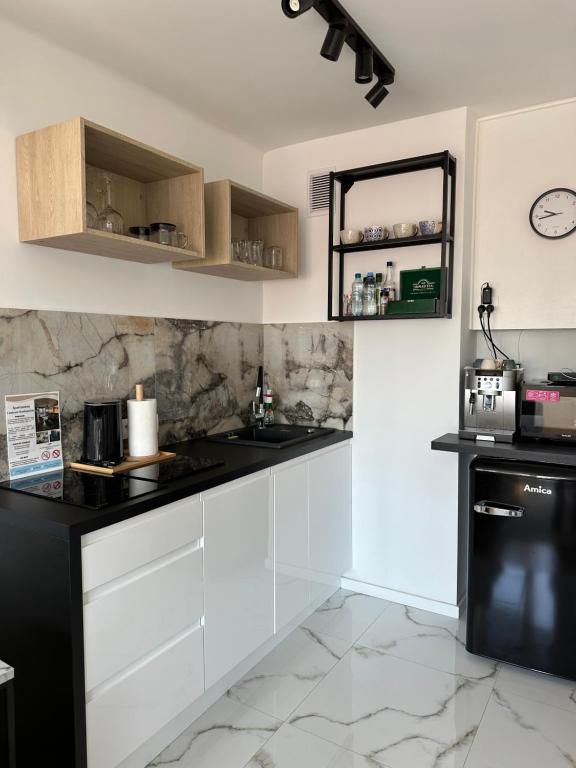 Kuchyňa alebo kuchynka v ubytovaní Apartament Warszawa Centrum Śródmieście