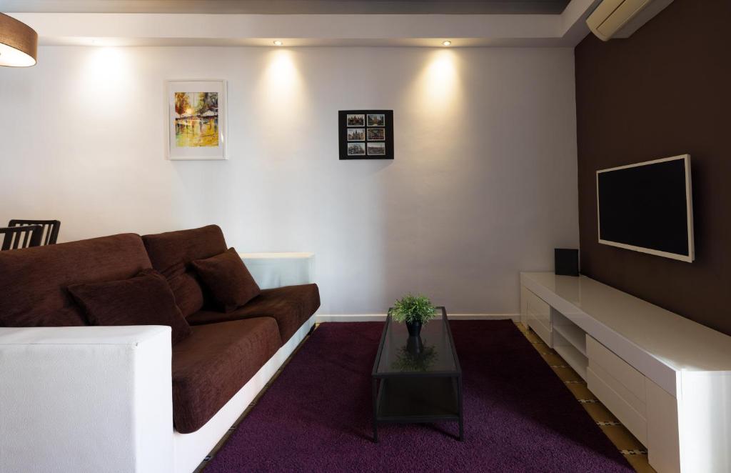 TV a/nebo společenská místnost v ubytování Stay U-nique Apartments Radas