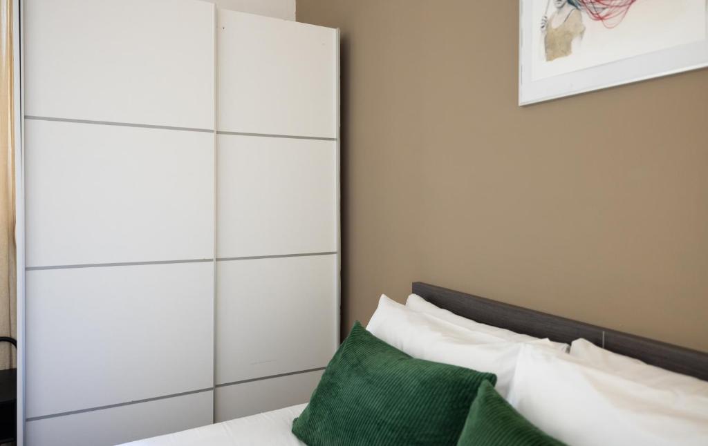 Postel nebo postele na pokoji v ubytování Stay U-nique Apartments Radas