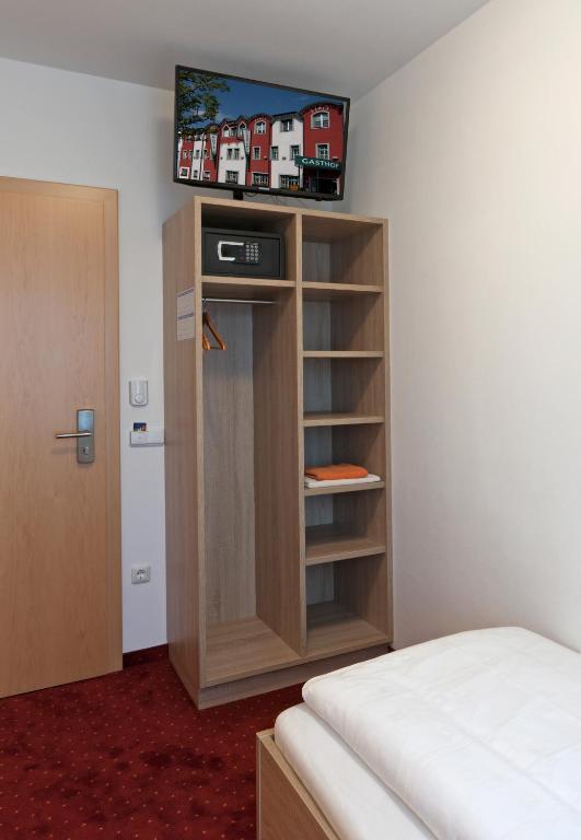 Postel nebo postele na pokoji v ubytování Hotel Restaurant Wallner I contactless check-in